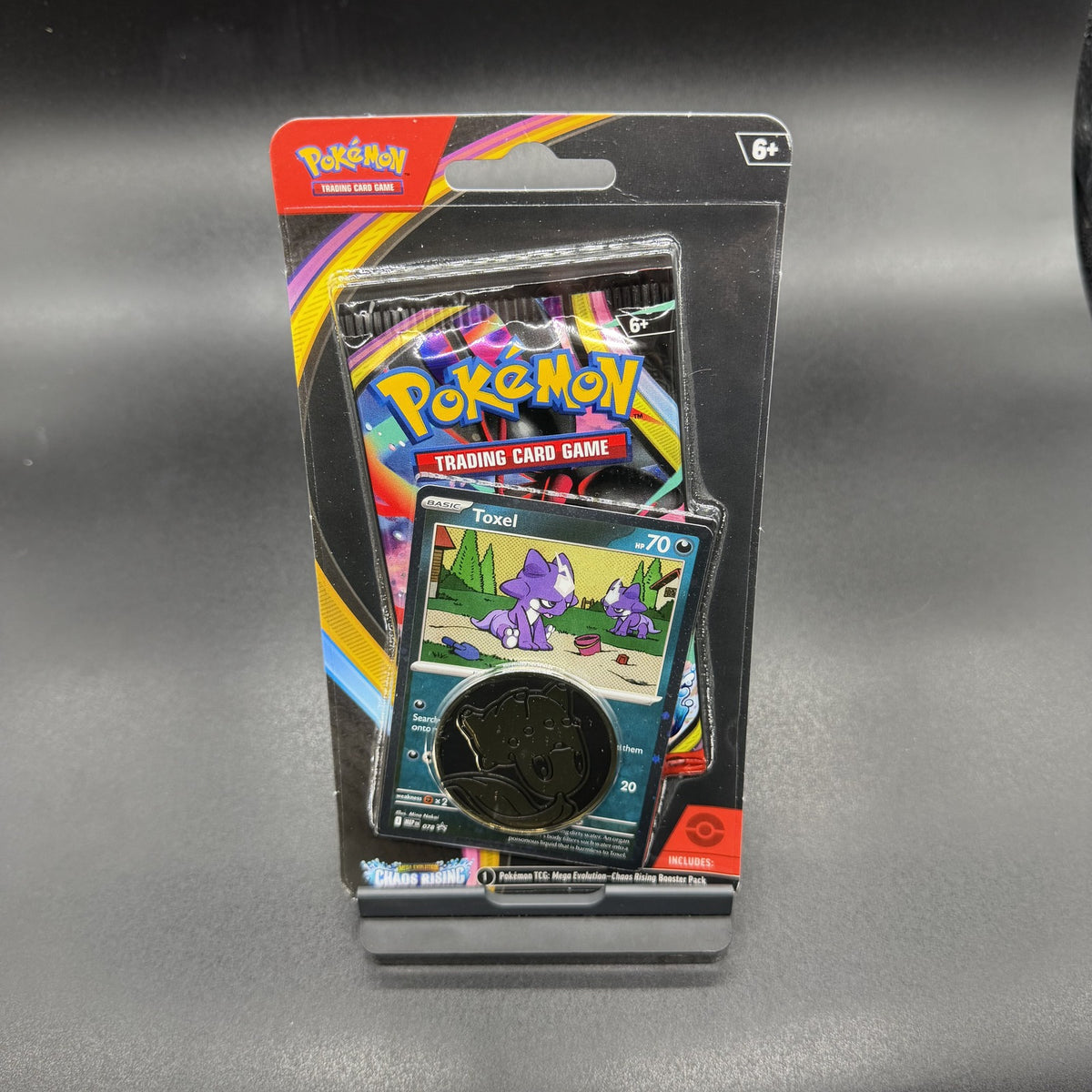 Pokémon TCG: Mega Evolution — Chaos Rising Checklane Blister (Toxel Promo + Coin)